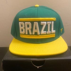 BRAND NEW, NEVER WORN BRAZIL FANATICS SNAPBACK , WITH BRAZIL FLAG ON BRIM
